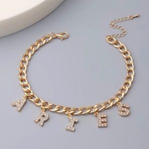 “Aries” Zodiac bracelet.